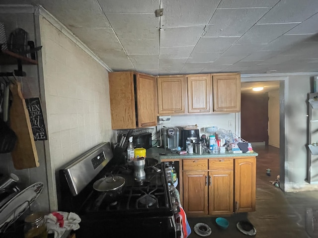 kitchen with stainless steel gas range