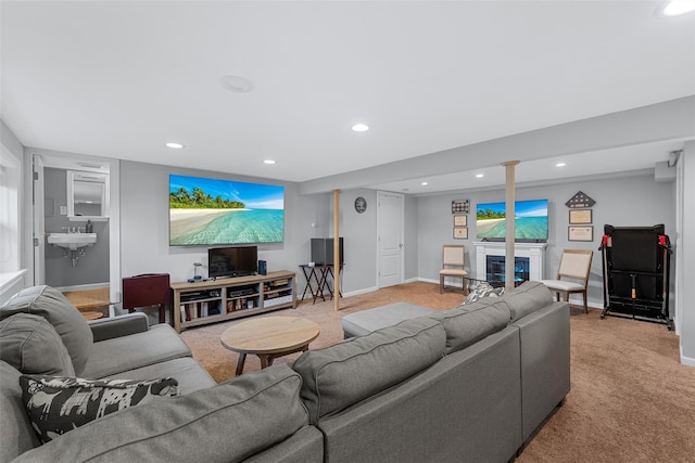 living room with light carpet and a fireplace