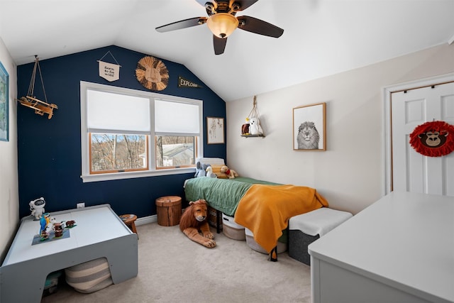 bedroom featuring lofted ceiling, ceiling fan, and carpet flooring