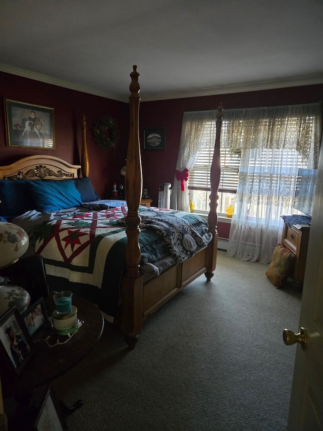 carpeted bedroom featuring crown molding