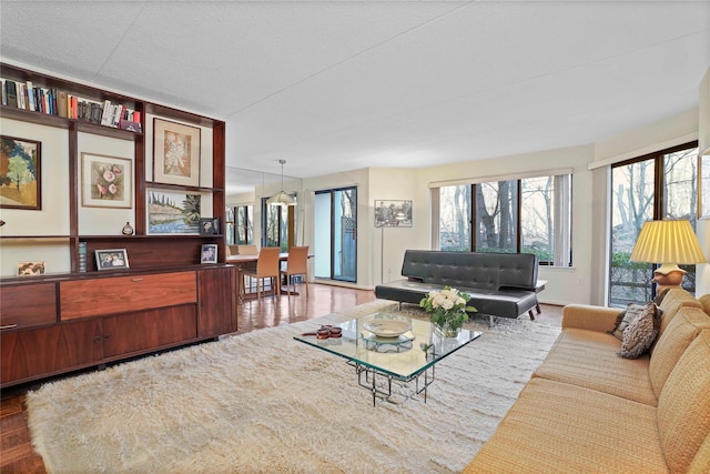 living room featuring parquet floors