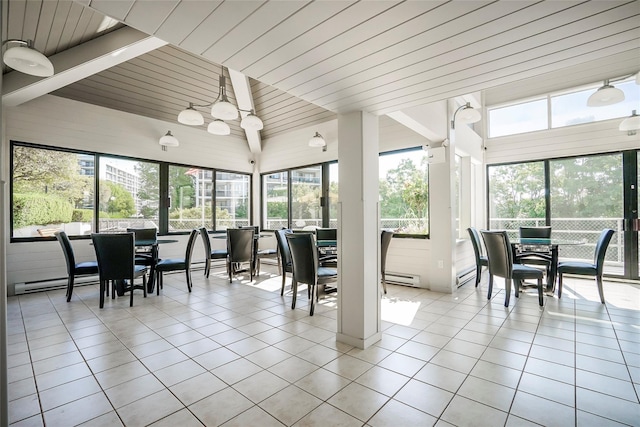 sunroom / solarium featuring beam ceiling, a baseboard heating unit, and wooden ceiling