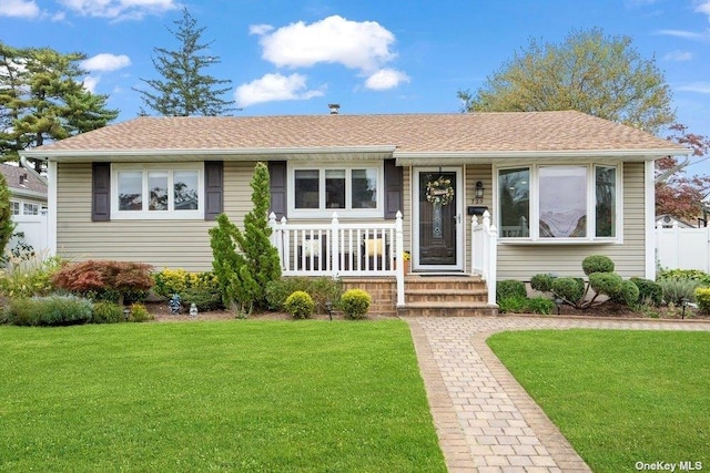 view of front of home with a front yard