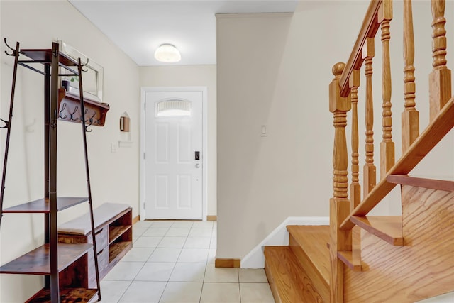 mudroom with light tile patterned floors