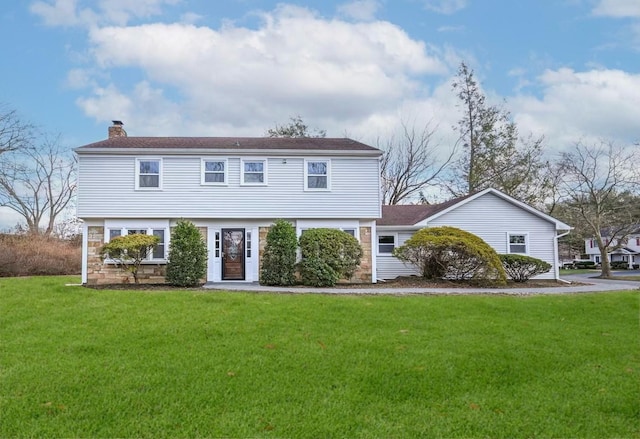 view of front facade with a front lawn