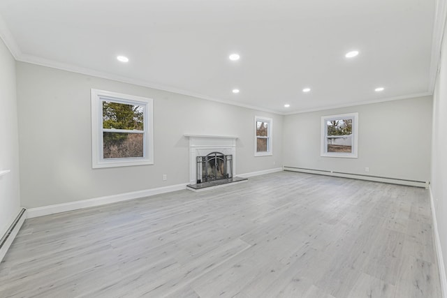 unfurnished living room featuring a healthy amount of sunlight, crown molding, a baseboard radiator, and light hardwood / wood-style flooring