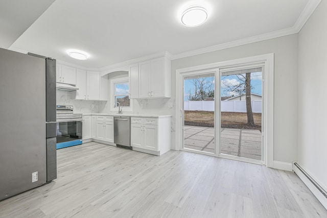 kitchen with a baseboard heating unit, sink, light hardwood / wood-style flooring, white cabinetry, and stainless steel appliances