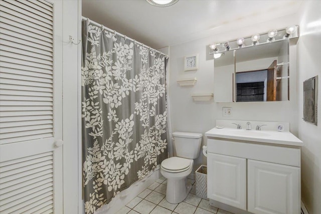 bathroom featuring a baseboard radiator, walk in shower, tile patterned floors, toilet, and vanity