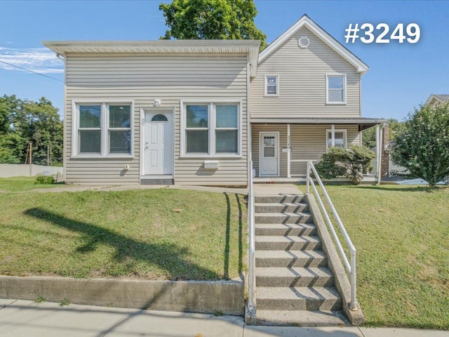 view of front of house featuring a front yard