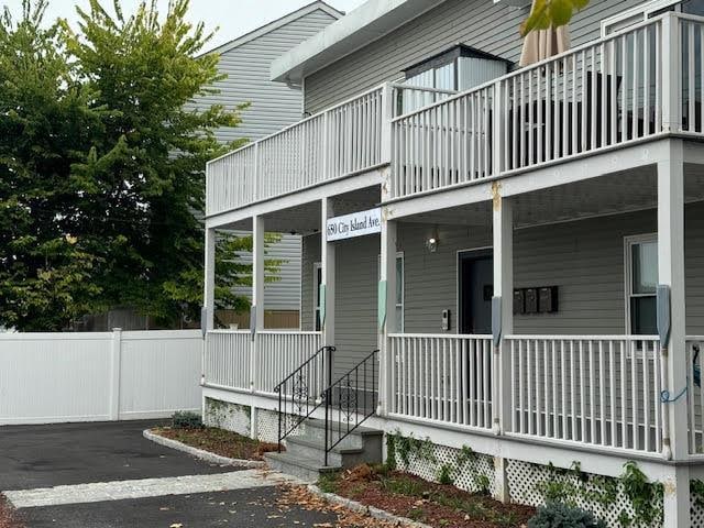 doorway to property featuring a balcony