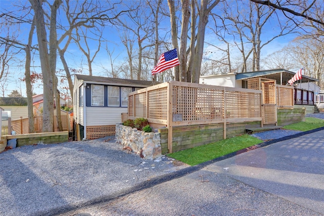 view of home's exterior featuring a deck