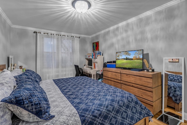 bedroom featuring a chandelier and ornamental molding