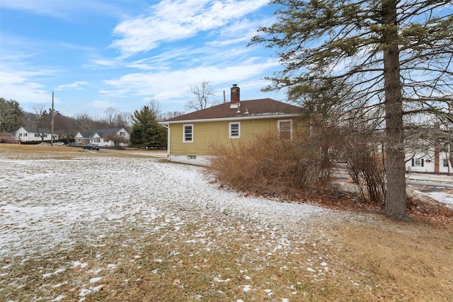 view of snow covered property