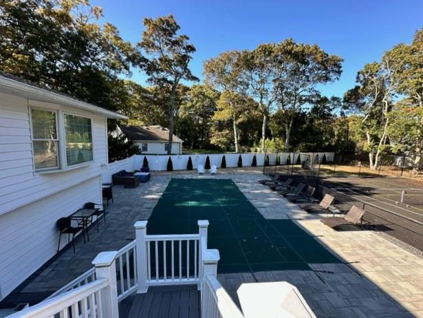 view of pool featuring a patio area