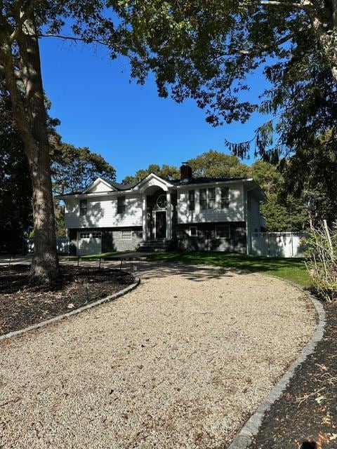 raised ranch with a garage