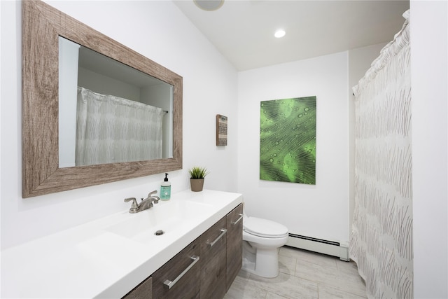 bathroom featuring tile patterned floors, vanity, toilet, and baseboard heating