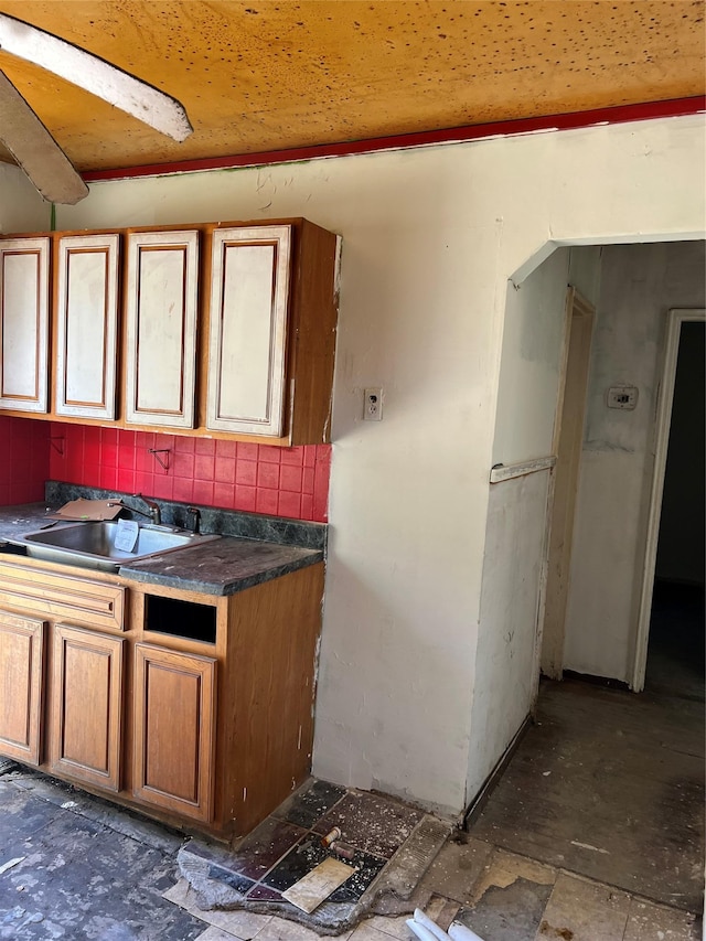 kitchen with sink and backsplash