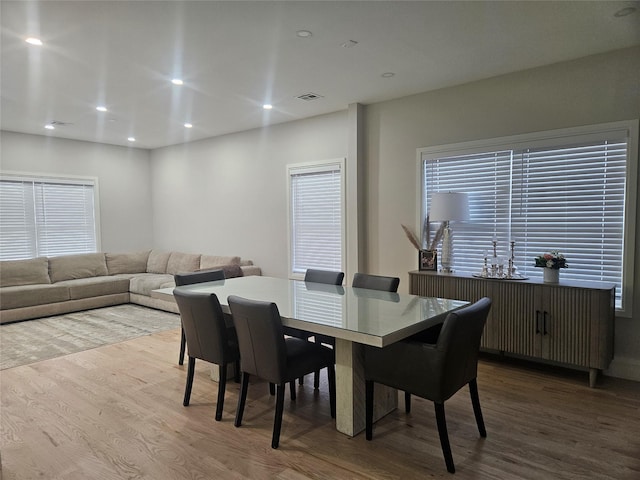 dining area with light hardwood / wood-style flooring