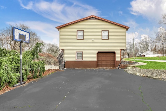 view of home's exterior with a garage