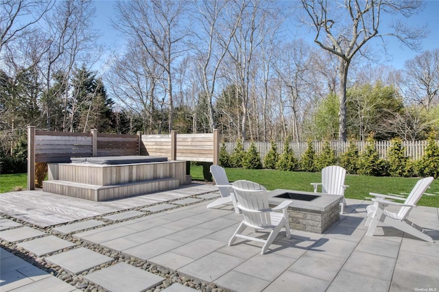 view of patio / terrace with an outdoor fire pit