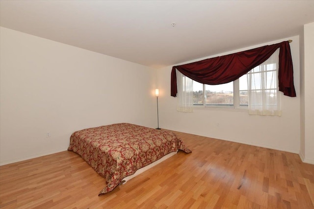 bedroom featuring light hardwood / wood-style floors