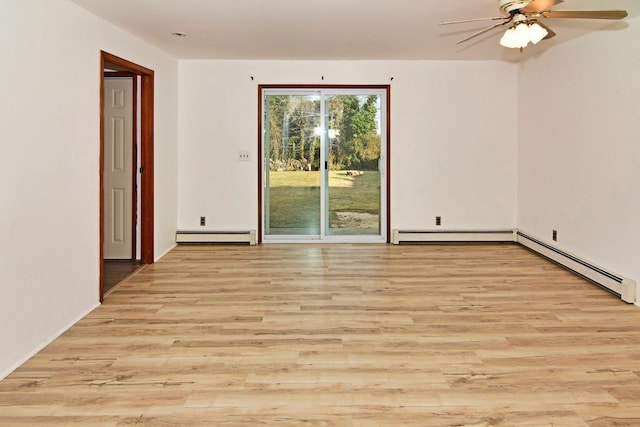 spare room with light hardwood / wood-style flooring, baseboard heating, and ceiling fan