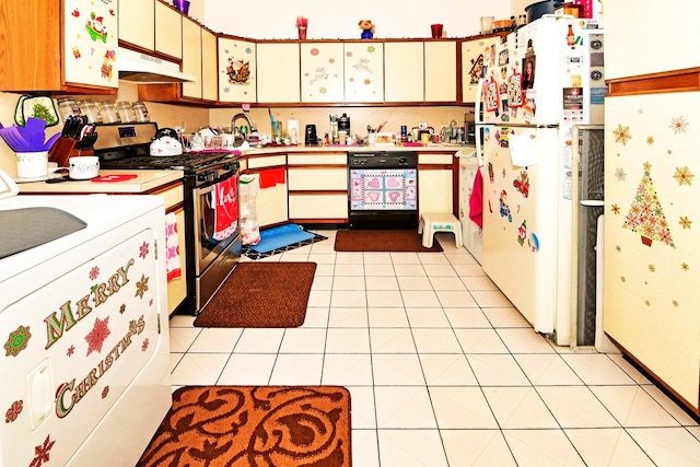 kitchen with light tile patterned floors, white appliances, and white cabinetry