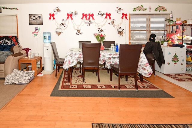 dining area with wood-type flooring