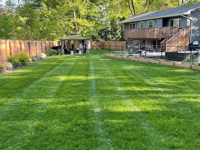 view of yard with a gazebo and a deck