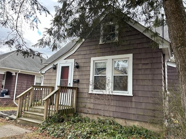 bungalow-style home with a garage