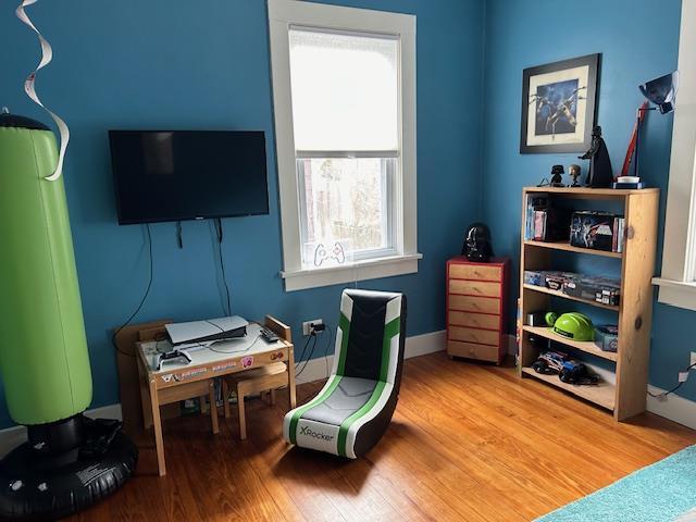 living area featuring hardwood / wood-style flooring