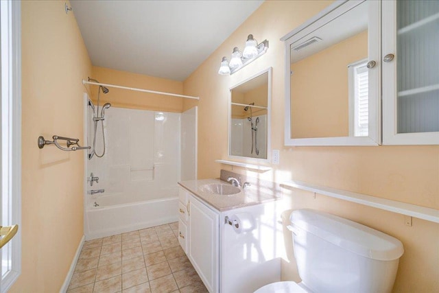 full bathroom featuring tile patterned floors, vanity, toilet, and tub / shower combination