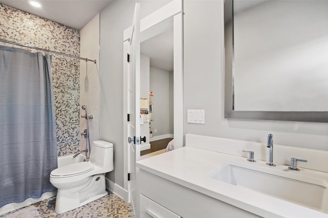 full bathroom featuring toilet, vanity, and shower / bath combo