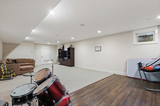 rec room featuring dark hardwood / wood-style flooring