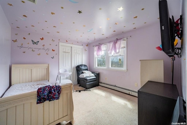 bedroom featuring carpet floors and a baseboard radiator