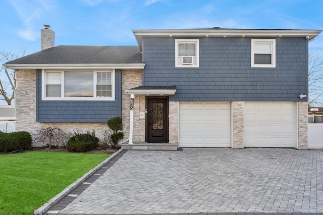 tri-level home with a garage