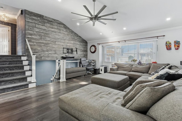 living room with wood-type flooring, vaulted ceiling, ceiling fan, and ornamental molding