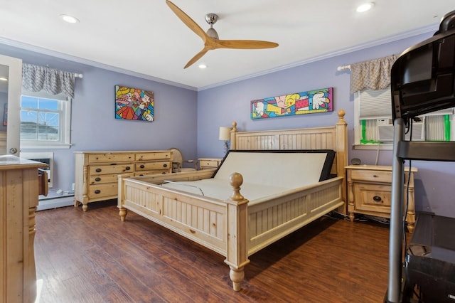 bedroom featuring cooling unit, crown molding, dark hardwood / wood-style floors, ceiling fan, and baseboard heating