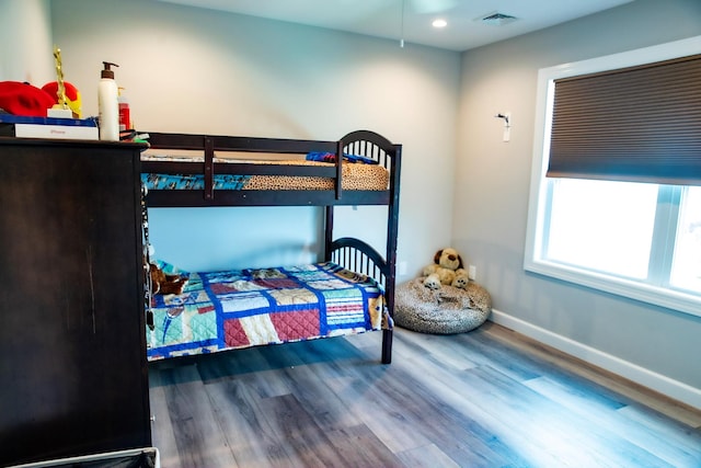 bedroom featuring hardwood / wood-style floors