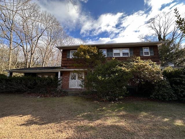 view of front of home with a front yard