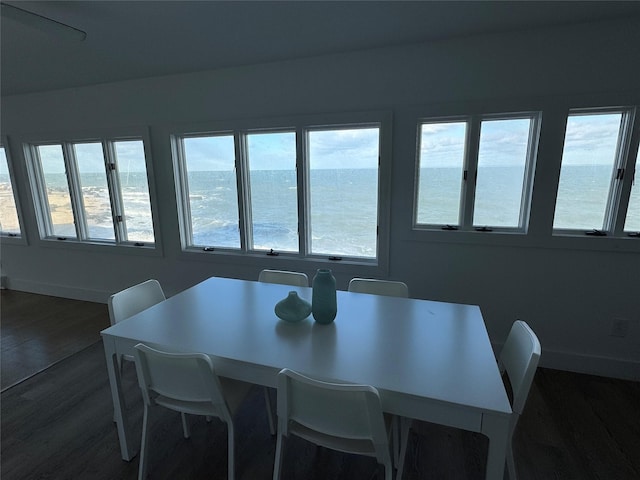 dining room with a water view