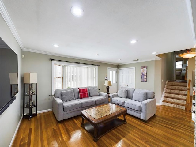 living room featuring dark hardwood / wood-style flooring and ornamental molding