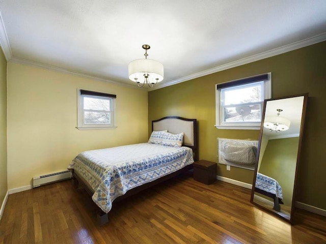 bedroom with baseboard heating, crown molding, and dark hardwood / wood-style flooring