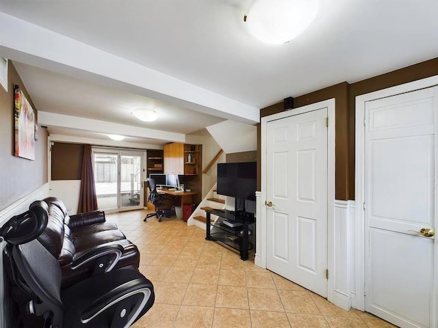 living room with light tile patterned floors