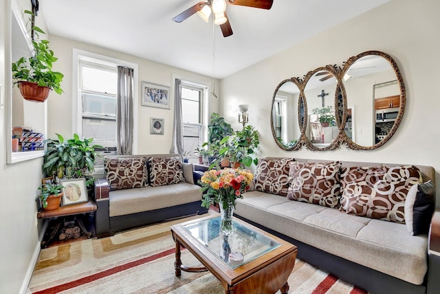 living room featuring ceiling fan