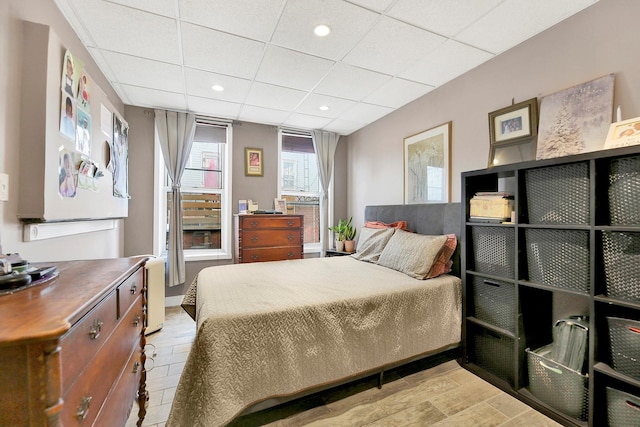 bedroom with a drop ceiling