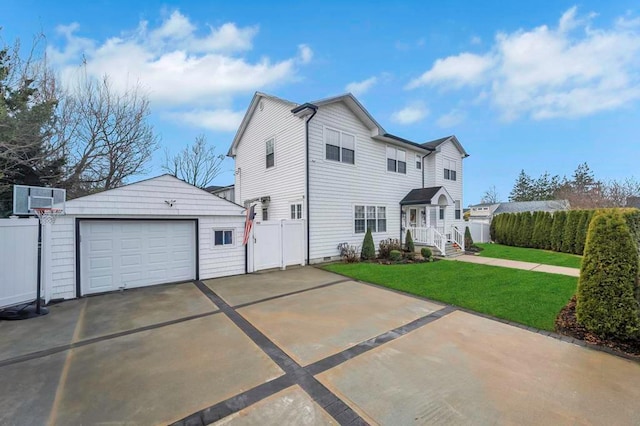 view of front of property with cooling unit, an outbuilding, a front lawn, and a garage