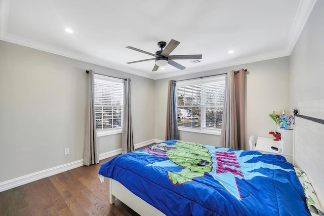 bedroom with ceiling fan, crown molding, and dark hardwood / wood-style floors