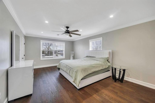 bedroom featuring ceiling fan, crown molding, and dark hardwood / wood-style floors