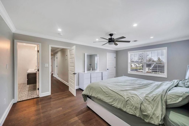 bedroom with ceiling fan, dark hardwood / wood-style flooring, ornamental molding, and connected bathroom